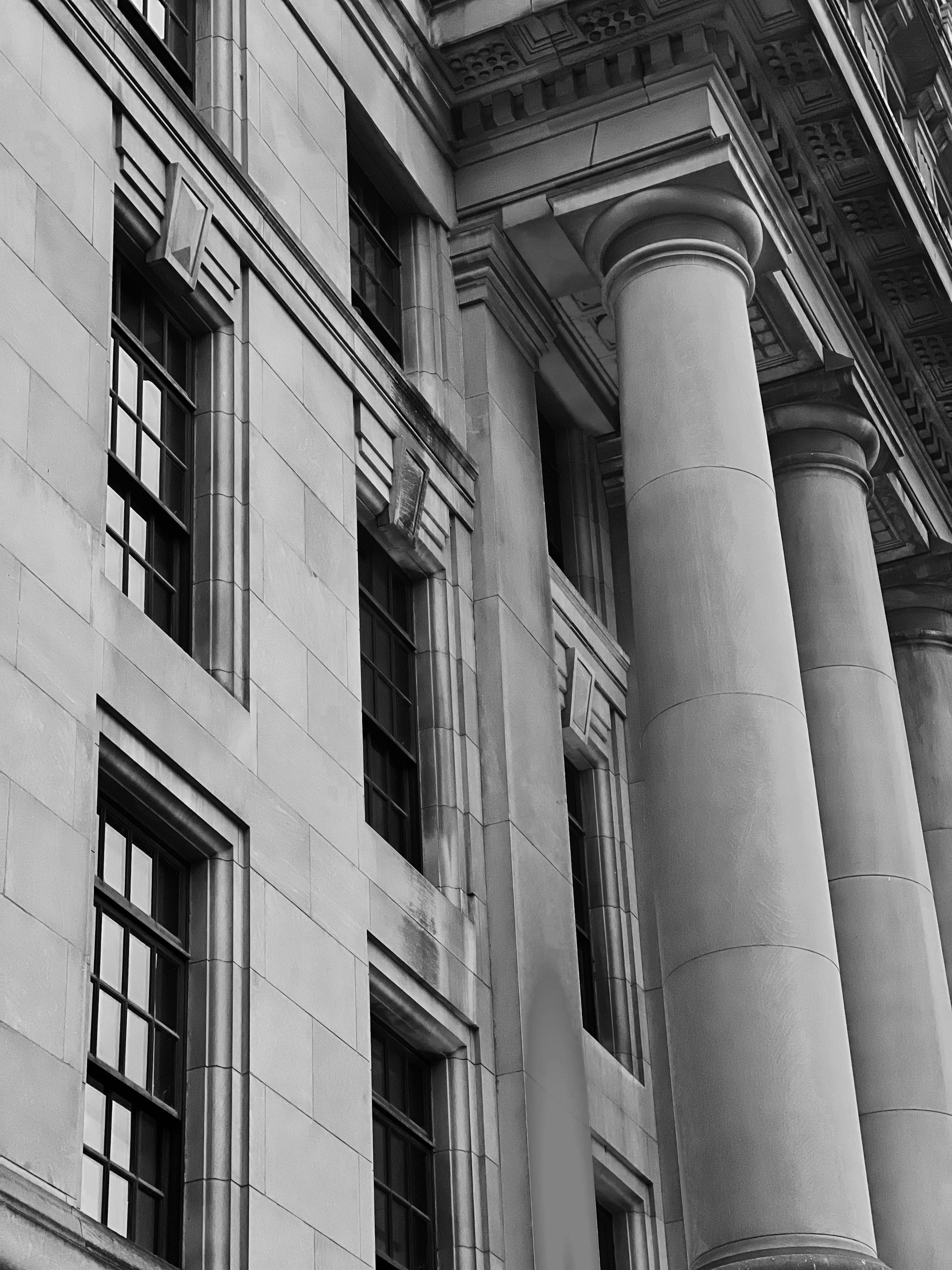 Architectural details of a stone façade with columns